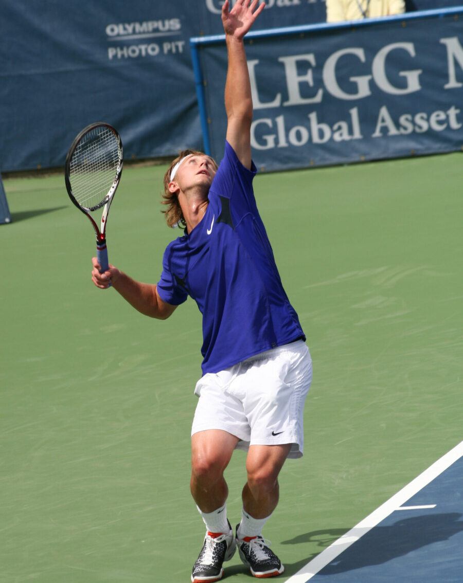 Tennis player serving